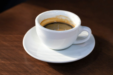 Espresso coffee hot in wooden.