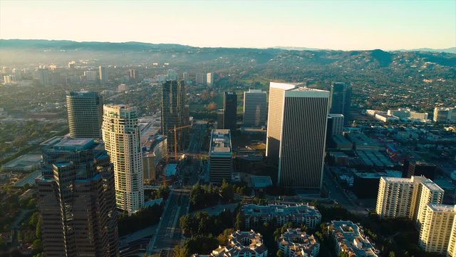 Studio City Los Angeles CA December 2018 sunset 5PM near skyline aerial view with Beverly Hills and the Santa Monica Mountains in background from helicopter drone plane