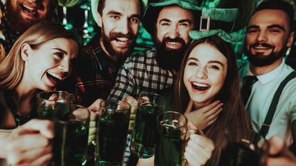 Young Company With Beer Glasses. St Patrick's Day.