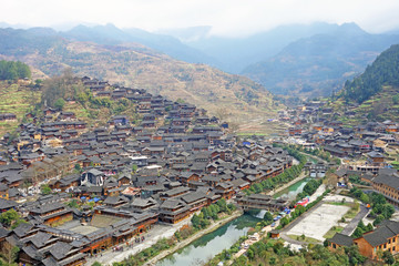 Qian Hu Miao Zai Village in morning mist , Guizhou province China.