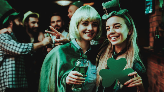 Two Girls In Carnival Clothes. St Patrick's Day.