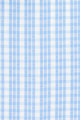 Background of the texture of the fabric. Cell pattern