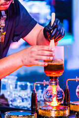 Showcase Syphon Coffee maker by syphonist./ Syphon Coffee or Vacuum Coffee is full immersion tasteful, this process show mix coffee beans into boiling water.
