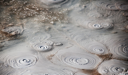 Geothermal mud pool along artists paint pot trail in Yellowstone National Park