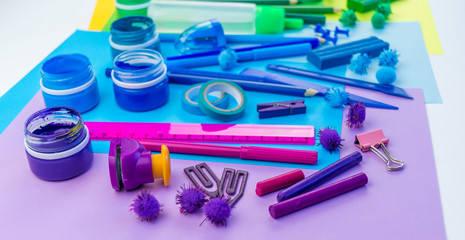 School accessories are laid out in the form of a rainbow. white background.