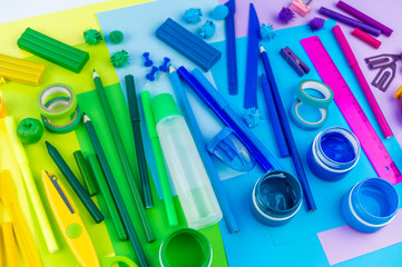 School accessories are laid out in the form of a rainbow. white background.