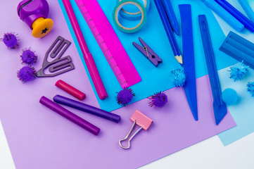 School accessories are laid out in the form of a rainbow. white background.