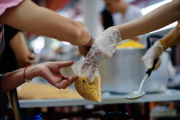 Donating food to beggars to alleviate hunger : the concept of sharing help to fellow human beings...