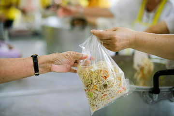 The hands of the poor receive food from the hands of the humane : the concept of relief.