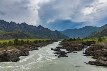 Great spring water on the Katun River and its surrounding mountains, Altai, Russia
