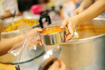 Hand-feeding to the needy in society : concept of food sharing