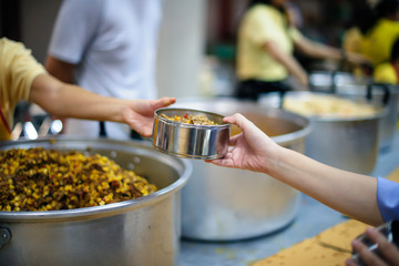 Hand-feeding to the needy in society : concept of food sharing