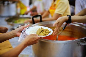 Hand-feeding to the needy in society : concept of food sharing
