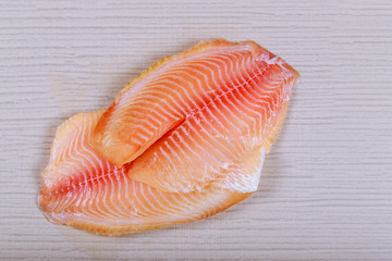 Raw fresh fish fillet tilapia with for cooking for table