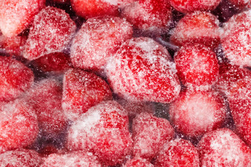 Frozen strawberries in plastic pack, top view