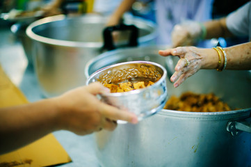 Charity food shared to everyone in society and the poor need this charity food.