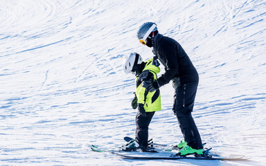 People are enjoying kiing	/ snowboarding