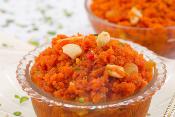 Indian Popular Sweet Food Carrot Halwa Also Know as Gajar ka Halwa, Carrot Dessert, Carrot Halva or Gajrela is a Carrot-Based Sweet Dessert Pudding From India - obrazy, fototapety, plakaty