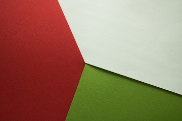 three colorful sheets of paper together