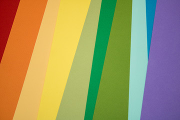 many different sheets of colored paper are folded in order