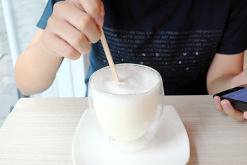 Hot milk in clear glass