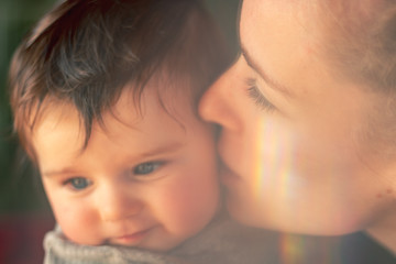 mother and baby portrait with refraction of light