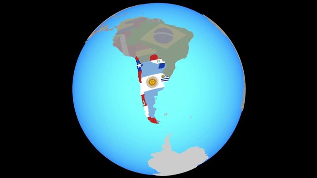 Closing in on Southern Cone with national flags on blue political globe. 3D illustration.
