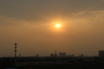 Obraz premium sunset over city