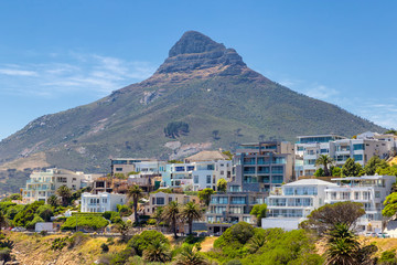 Lion's head mountain and apartment buildings on the coast of Cape Town