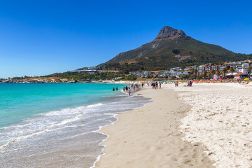 Camps bay beautiful beach with turquoise water and mountains in Cape Town, South Africa
