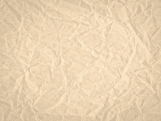 Texture of beige crumpled craft paper. Texture for design, abstract background