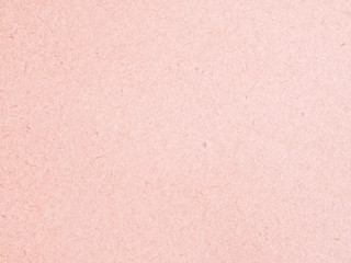 Texture of light red cardboard closeup, abstract paper background