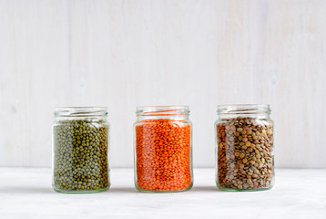 Dried Mung beans, and lentils in glass jars