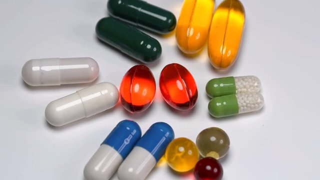 many pills and vitamins of different colors