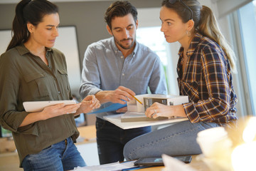 Architects looking over project for modern house design