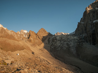 Sunset in the mountains. Ala Archa national park, Kyrgystan. Small outdoor toilet.