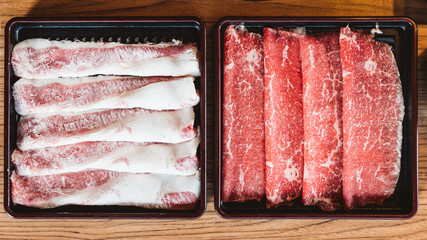 Rare slices authentic A5 Grade Japanese Wagyu beef with high-marbled texture for Shabu.