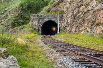 a train comes out the tunnel © Konstantin