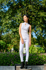 Fototapeta premium Beautiful woman posing - standing, contemplation and blank expression