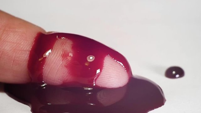 Hand with blood on white background.