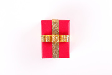 Multi purpose festive composition with present wrapped in colorful paper and tied with satin silk bow. Gift box for differet occasions. Close up, top view, copy space, background, flat lay.