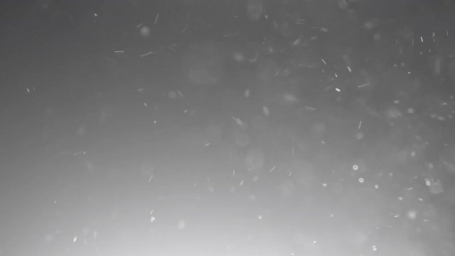 Slow motion of real dust particles float in air after explosion macro