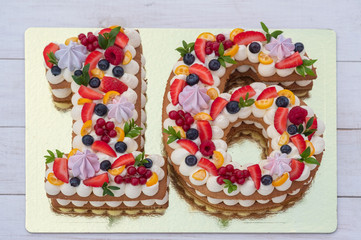 homemade cake in the form of the number sixteen