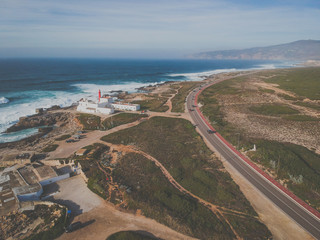 Fototapeta na wymiar Aerial view from a lighthouse in the Portuguese coastline. Cape raso Lighthouse Cascais, Portugal