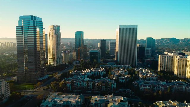 Studio City Los Angeles CA December 2018 sunset 5PM near skyline aerial view with Beverly Hills and the Santa Monica Mountains in background from helicopter drone plane