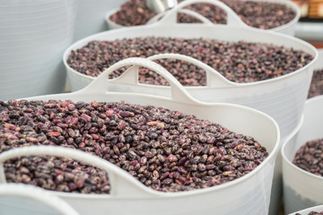 beans in big bags in a market for sale