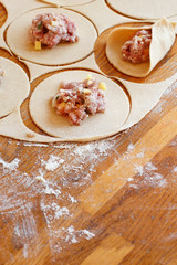 Making dumplings manti