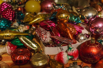 Different colorful Christmas toys ,golden fish, stars, cones. New year.Christmas background.Seventies of the last century