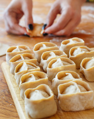 Making dumplings manti