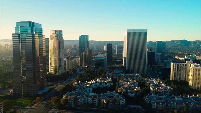 Studio City Los Angeles CA December 2018 sunset 5PM near skyline aerial view with Beverly Hills and the Santa Monica Mountains in background from helicopter drone plane